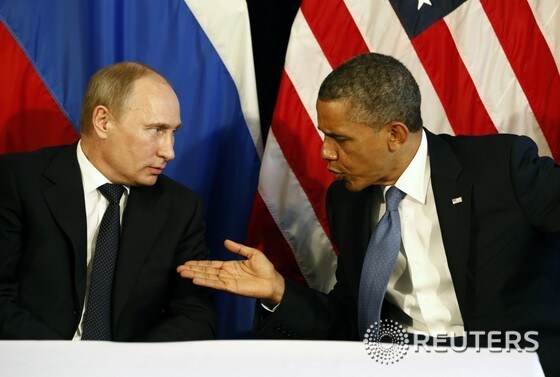 대화하고 있는 버락 오바마 미국 대통령(오른쪽)과 블라디미르 푸틴 러시아 대통령.© 로이터=뉴스1 2014.11.05/뉴스1 © News1