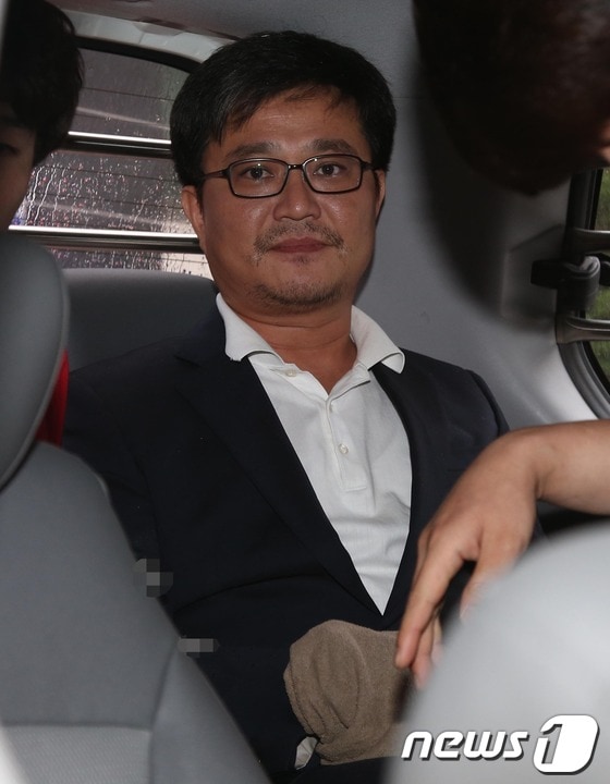 60대 재력가 청부살해 사건과 관련해 살인교사 혐의로 구속된 김형식(44) 서울시의회 의원. 2014.7.3/뉴스1 © News1