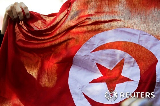 재스민 혁명 당시 등장한 튀니지 국기.© 로이터=뉴스1