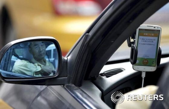 중국판 우버택시의 일종인 디디 추싱의 앱을 장착한 중국 택시. © 로이터=뉴스1