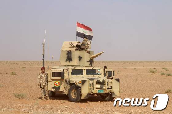 이라크 라와로 향하는 정부군의 모습. © AFP=뉴스1