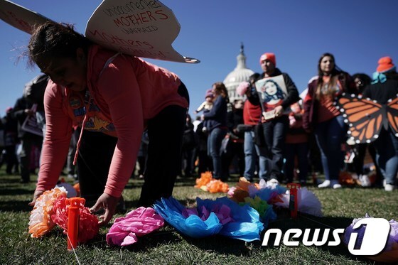 미국의 이민권 운동가들이 워싱턴DC에서 DACA 관련 시위를 벌이고 있다. © AFP=뉴스1