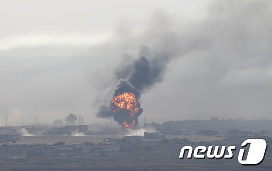 시리아 북부 라스 알 아인 지역에서 터키군의 폭격이 벌어진 후의 모습. © 로이터=뉴스1