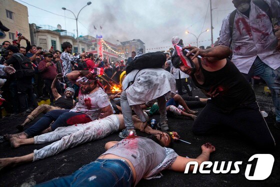 이라크의 수도 바그다드 타흐리르 광장의 반정부 시위 현장 © AFP=뉴스1