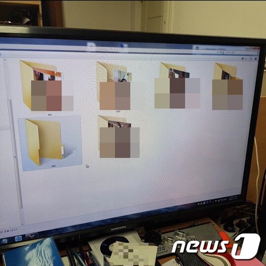 부산의 한 사립여고 모 교사의 업무용 PC에 저장된 각종 포르노 영상과 사진이 든 폴더.(독자제공)© 뉴스1