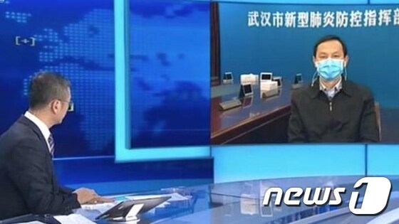 마궈창 중국공산당 우한시위원회 서기(오른쪽) <중국중앙TV 갈무리>
