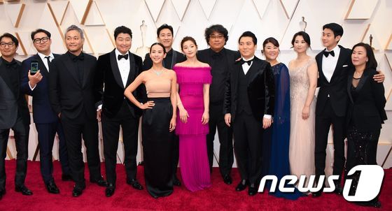 South Korean director Bong Joon-ho arrives with the cast and crew of 