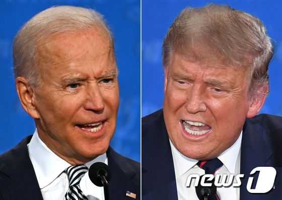 조 바이든 미국 민주당 대선 후보(왼쪽)와 도널드 트럼프 대통령이 29일(현지시간) 미국 대선 1차 토론에서 격돌했다. © AFP=뉴스1